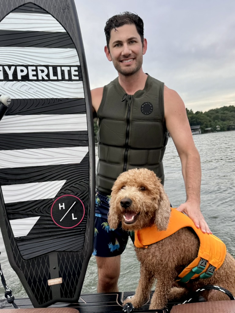 Ben Kogut with his Goldendoodle Mazzy at the lake