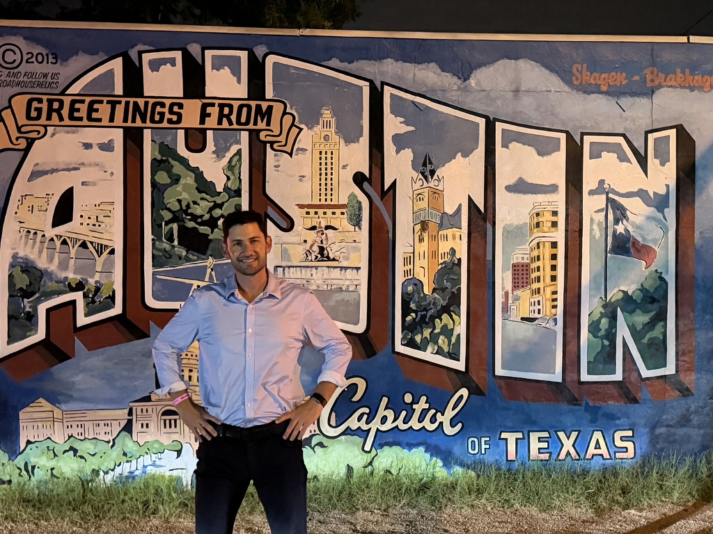 Ben Kogut at the Greetings from Austin mural