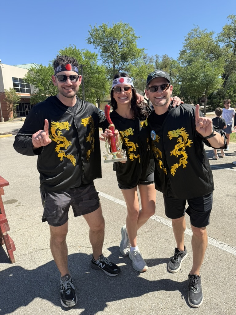 Ben Kogut celebrating a chili cook-off trophy