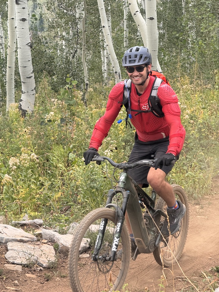 Ben Kogut mountain biking through aspens